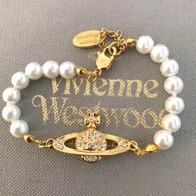 Vivienne Westwood Gold White Pearl Bracelet • $50