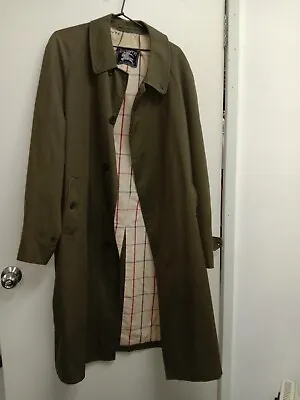 Burberry’s Men’s Full Length Coat. • $800