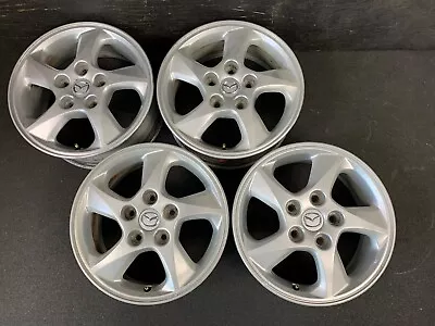 (4) Mazda MPV Original Silver Wheels Rims + Caps 15  Hol.64847 Mazda 3 • $495