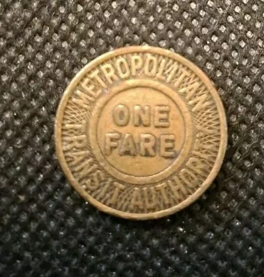 METROPOLITAN TRANSIT TOKEN!   E3189UXX • $5.71