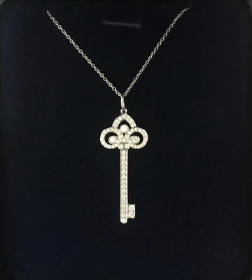 £2999 • Buy Tiffany & Co. Fleur De Lis Diamond Key Pendant With 18  Chain, Box And Pouch.