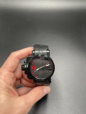 $650 • Buy Oakley Gearbox Stealth Black W/ Black Dial W/ Red Accents Watch