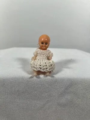 Tiny Plastic Doll • $45