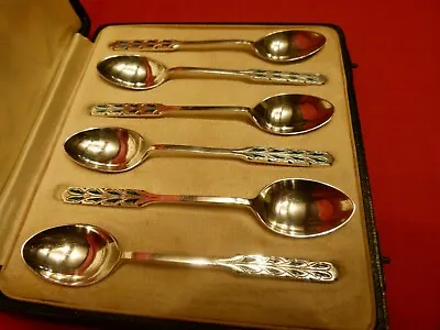 LOVELY CASED SET OF 1933 LIBERTY &  Co SOLID SILVER AND TURQUOISE ENAMEL SPOONS. • £379