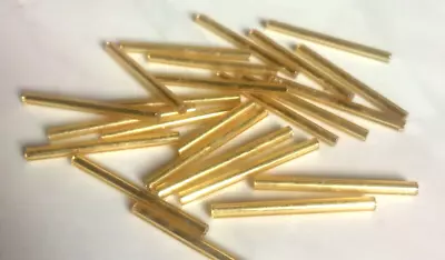 25 X Long Gold Coloured Glass Bugle / Tube Beads. Size 30mm Long 2.5mm Wide. • £2.99