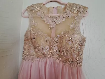 Size 5/6 Jr Gown Mascarade Pink With Rhinestones.  • $45