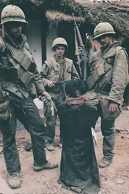 Vietnam  War  Photos --  US Soldiers  With VC Prisoner In Village • $3.99