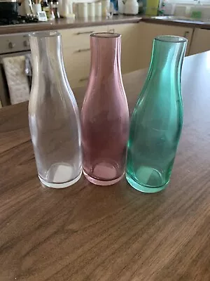 3 Coloured Glass Bottles • £10