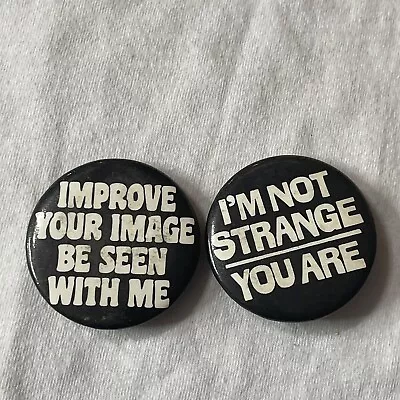 Vtg Lot Of 2 Pinback Buttons IMPROVE IMAGE SEEN W/ ME & YOU ARE STRANGE B004 • $4.99