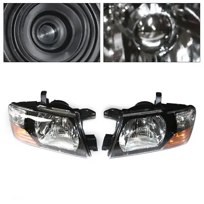 For Mitsubishi Pajero Montero L & R Set Headlights Head Lights Lamps 2000-2006 • $151