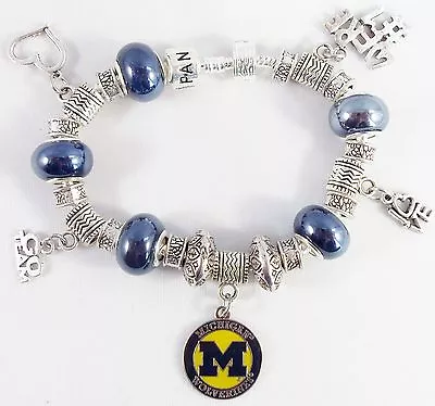 MICHIGAN WOLVERINES NCAA Licensed Charm Silver Bracelet Team BLUE GLASS BEADS • $22.99