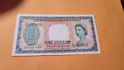 Malaya 1 Dollar Gem Unc • $850
