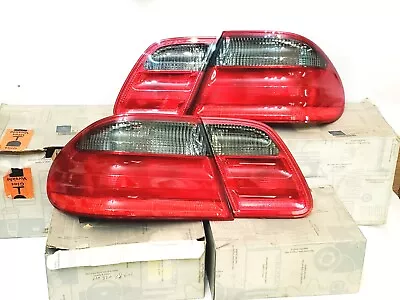 New Genuine Mercedes W210 SMOKE Tail Light Assembly E55 AMG E430 E320 Nos • $1100