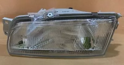 NOS 1991-1995 Mitsubishi Lancer Left Headlight MB907213 Mitsubishi MB907213 • $68.50