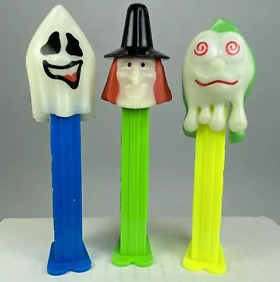 Glow In The Dark Faces Misfit Witch White Face Naughty Neil Slimey Sid PEZ  • $9.35