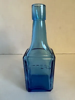 Vintage Wheaton Glass 6  Blue Glass Bottle With Raised Lettering  Bitters  • $7