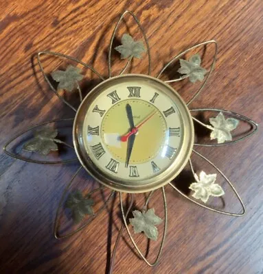 Vintage United Clock Corp Wall Electric Clock Star/ Flower/Sun Design Works Good • $48