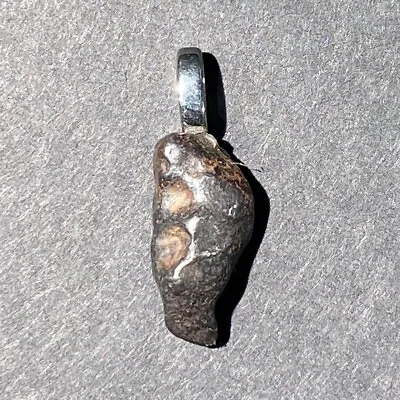 Meteorite Pendant With Silver Mounting • $45