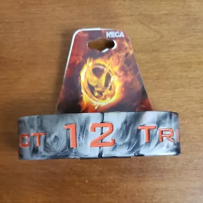 The Hunger Games Rubber Band Bracelet Mockingjay District 12 NECA NEW SEALED • $6.98