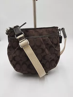 Coach Signature Brown Canvas Small Crossbody Handbag. • $40