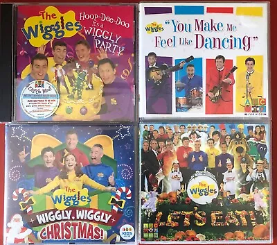 4x CDs The Wiggles HOOP-DEE-DOO It's A WIGGLY PARTY - LET'S EAT- CHRISTMAS .... • $65.50