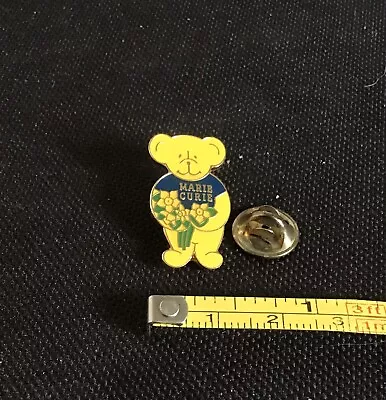 Marie Curie Cancer Care Bear With Bunch Of Daffodils Vintage Pin Badge  • £3.50