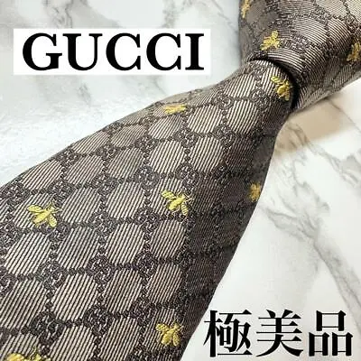 GUCCI Men’s Silk Narrow Tie Brown Gold Micro GG & Bee Pattern 148 X 7 Cm No Box • $199.77