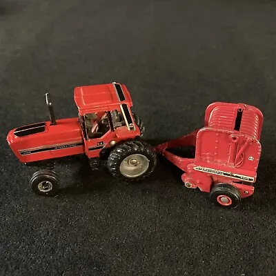 VINTAGE INTERNATIONAL RED TRACTOR TOY# 5088 And Baler 2400. NICE!! • $27.62