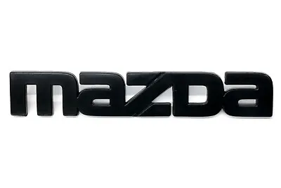 1984-1985 Mazda RX-7 Front Bumper Black MAZDA Emblem Logo OEM F023-51-770A • $43.07