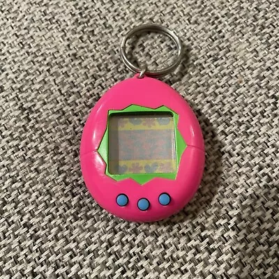 Original 1997 Bandai's Tamagotchi Virtual Reality Pet Pink And Green Keychain • $19.50