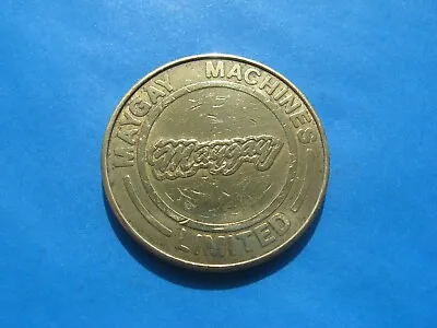 (K) MAYGAY MACHINE LIMITED  GOLD COLOURED 10p TOKEN COIN • £1