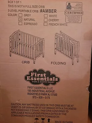 First Essential 3 Level Folding Baby Crib With Mattress  • £60
