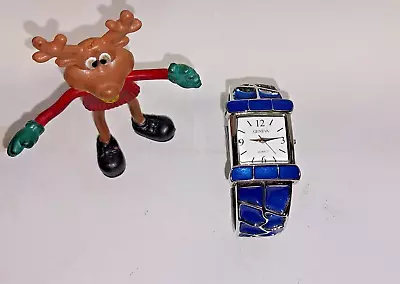 Vtg Geneva Ladies Blue Silver-Tone Watch Square Face Cuff Quarts Movement Watch • $15.95