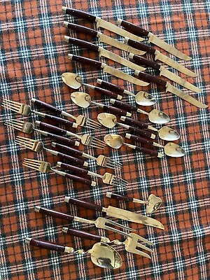 Vintage Midcentury Rosewood And Brass Silverware Set • $45