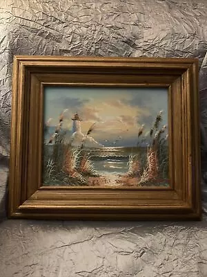 B.  Duggan Beach Lighthouse Oil On Canvas Painting Signed Approx   16” X 20” • $99