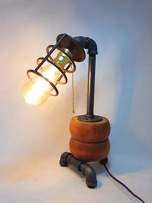 Steampunk Industrial Black Iron Pipe And Wood Rollers Table Lamp  • $79