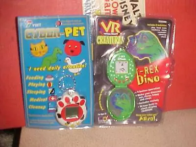 2 Vintage Virtual Reality Giga Pet LOT CYBER-PET PAW & T-REX Factory Sealed! • $75