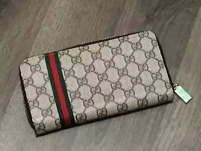 Gucci Zip Wallet • $45