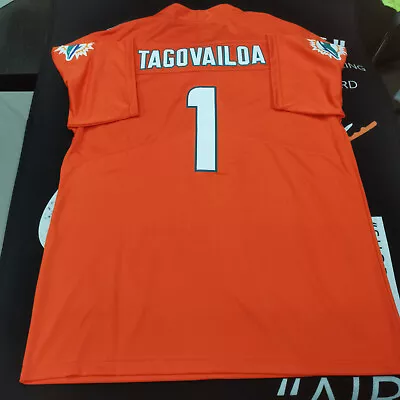 Tua Tagovailoa #1 Miami Dolphins Vapor Orange Jersey. • $46.99