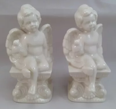 Pair Vtg Ceramic Cherub Sitting On Pillar Holding Bird Figurine Victorian Decor • $19.99