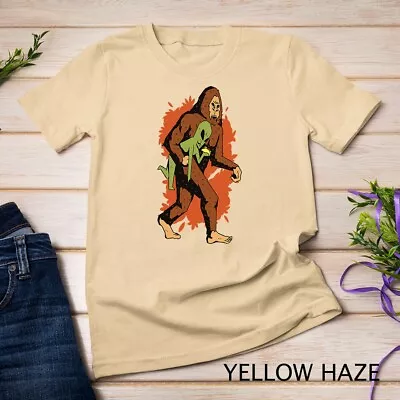 Funny Bigfoot Carrying Alien Eating Taco_ Sasquatch Aliens Unisex T-shirt • $16.99
