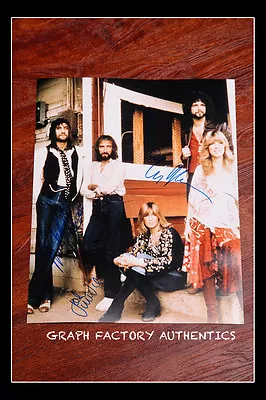 **Fleetwood Mac *McVIE - BUCKINGHAM - FLEETWOOD* Signed 11x14 Photo AD1 COA** • $300