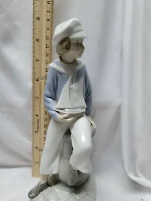 LLADRO 1972 SAILOR BOY WITH SAILBOAT LLADRÓ ITEM #01004810  Sailor Boy RETIRED • $157.87