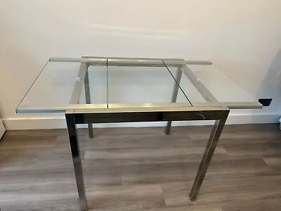 IKEA  Extendable Tempered Glass And Chrome Dining Table. 70cm X 75cm/115cm • £50