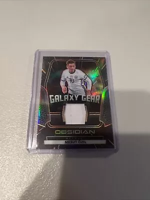 2020-21 Panini Obsidian Galaxy Gear Relics Electric Etch Orange /30 Mesut Ozil • $49.99