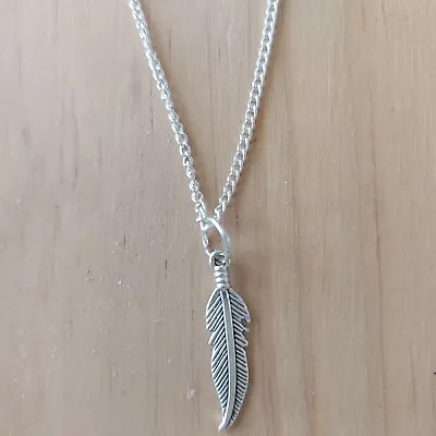 Metal Feather Charm Necklace And Silver Plated Chain • £3