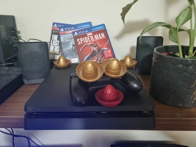 $220 • Buy Sony PlayStation 4 Slim 500GB + Disc 3 Games