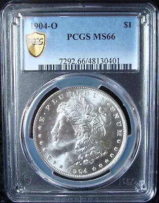 1904-O Morgan Silver Dollar - PCGS MS 66 - Gold Shield • $457