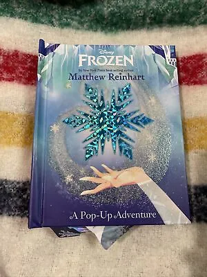 Frozen: A Pop-Up Adventure Reinhart Matthew 9781484737804 • $23