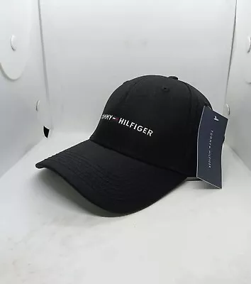 Tommy Hilfiger Cap. Black Colour And Have Adjustable Belt At The Back . • $19.95